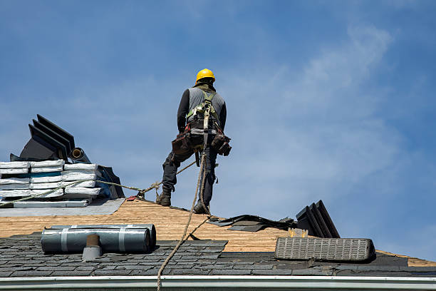 Professional Roof Replacement technician working in Dudley, MA